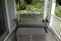 Old Swing. New Sunbrella Charcoal Bench Cushion