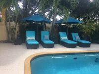 Poolside Chaise Cushions and Umbrellas